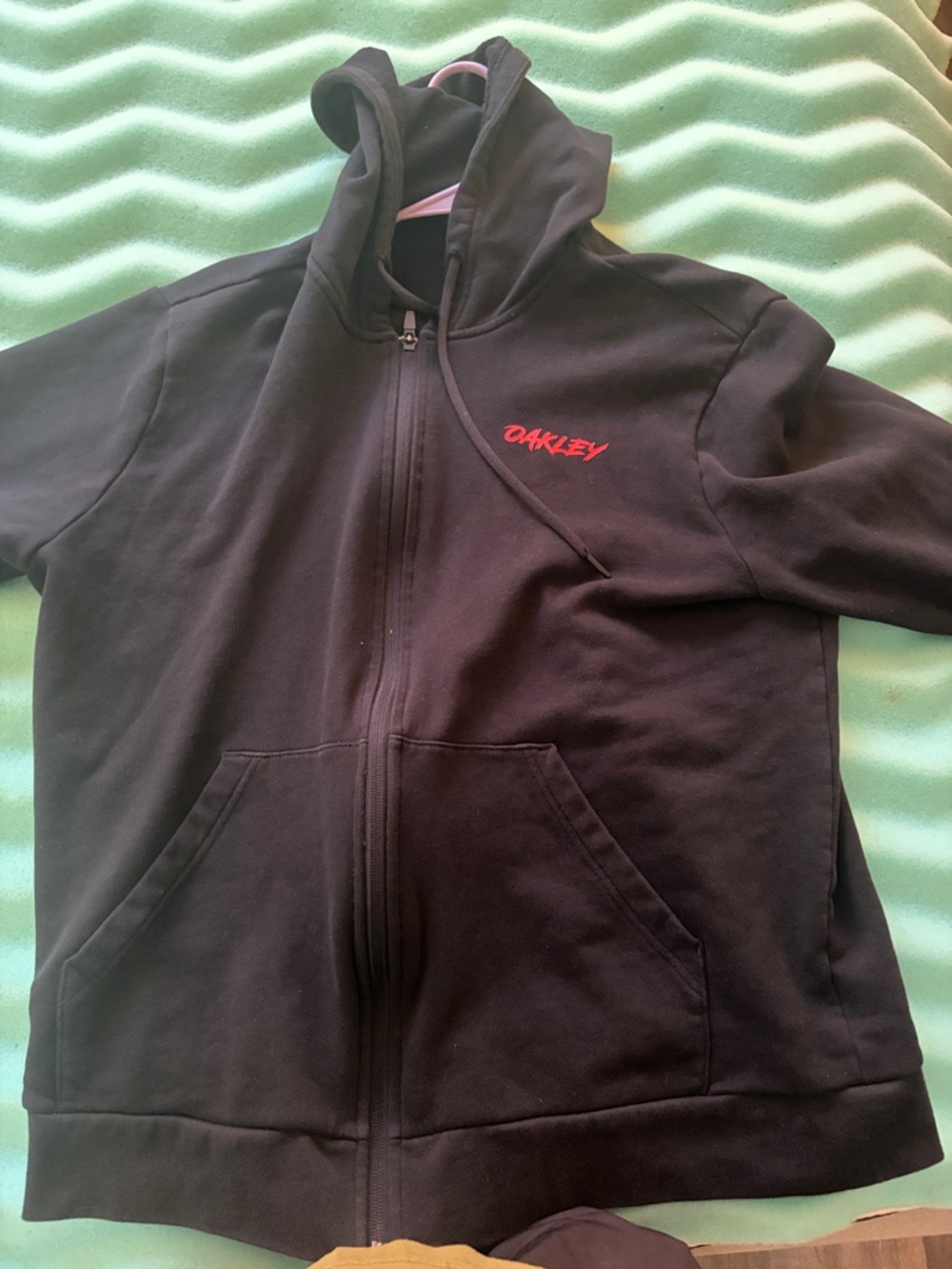 Oakley Black Zip-Up Hoodie with Red Script Logo